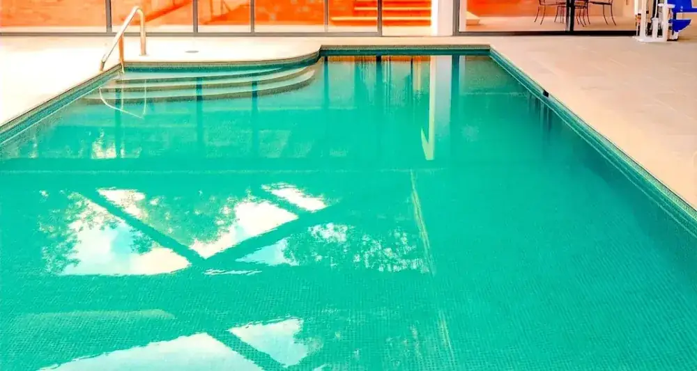 Pool mosaic installation where epoxy grout supports wet area performance