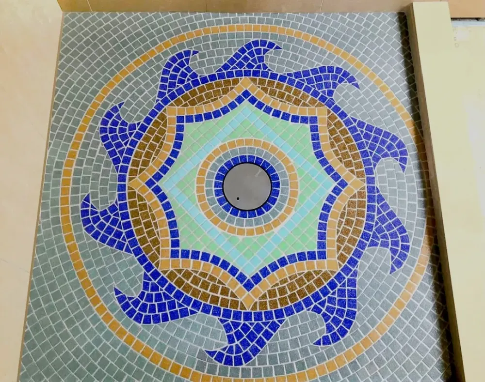 Artisan hand cut glass mosaic medallion shower floor