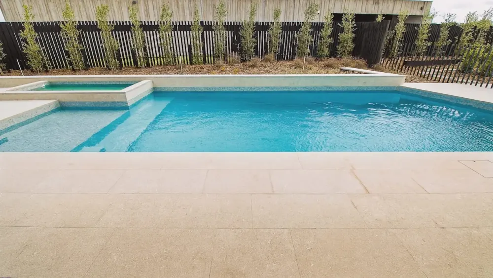 Precision tiled architectural pool and spa