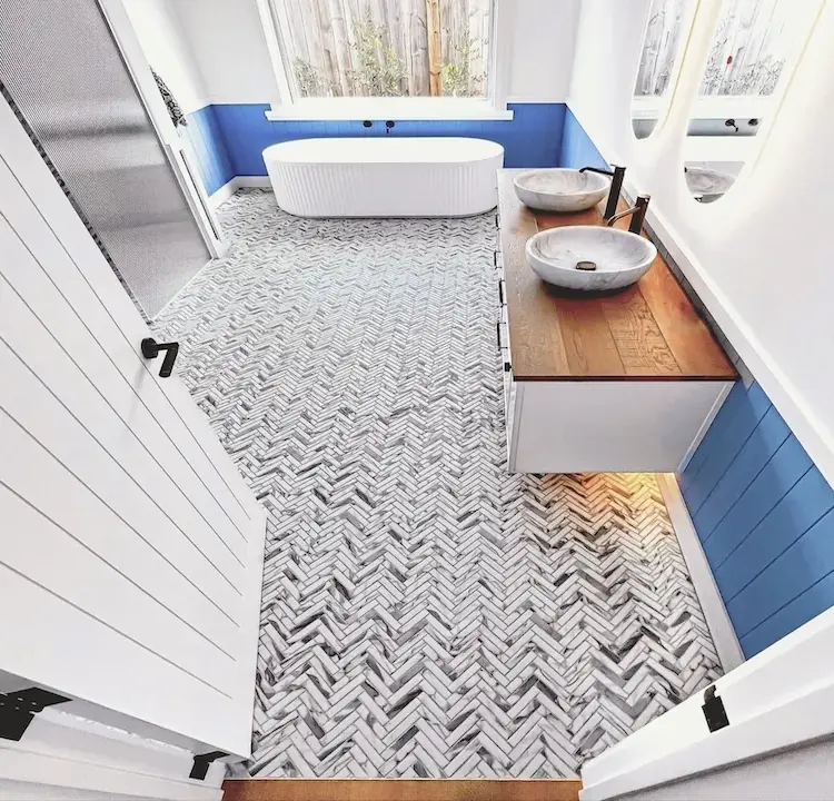 Mosaic herringbone tile pattern showing consistency and control