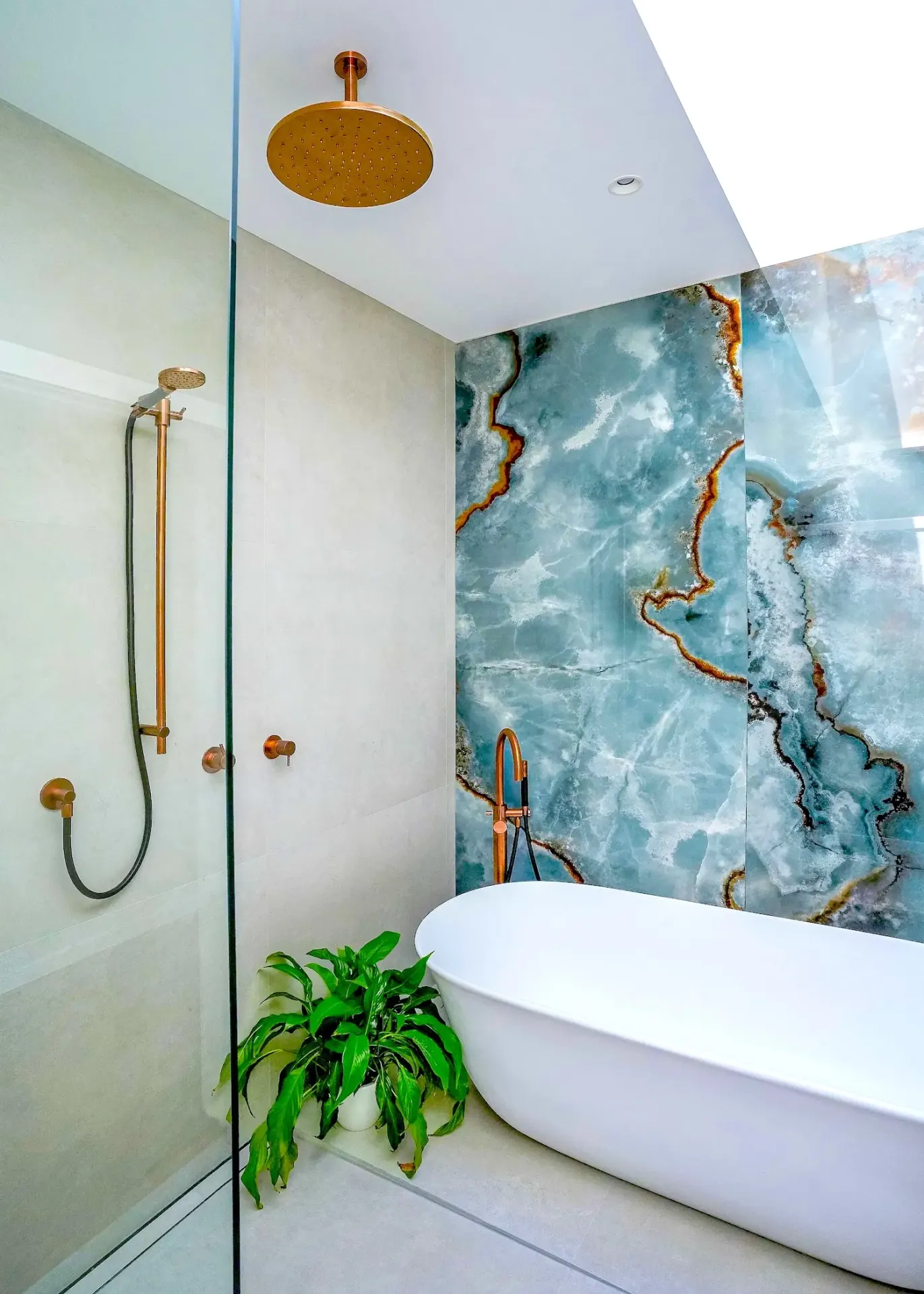 Large format onyx look porcelain panel shower wall installation in Tawharanui Rodney Auckland